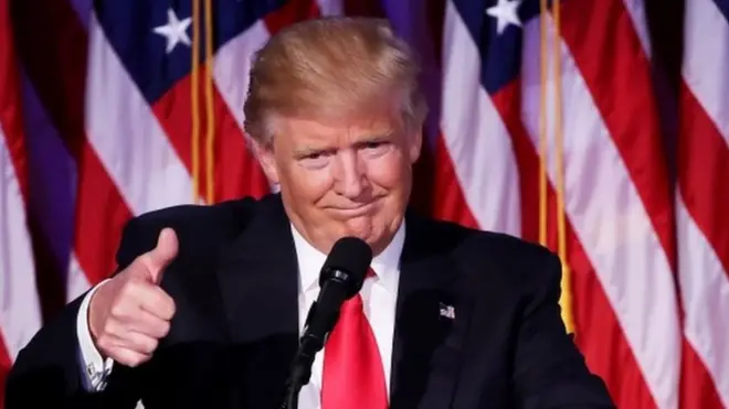 President Trump holds his thumb up