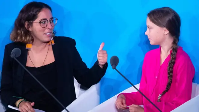 Грета Тунберг (справа) на саммите ООН