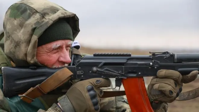 Russian serviceman aims his weapon during an exercise aimed at coordinating troops of the military contract unit 'Bars-13', at a military shooting range near Donetsk city, Donetsk region, eastern Ukraine, 05 February 2024