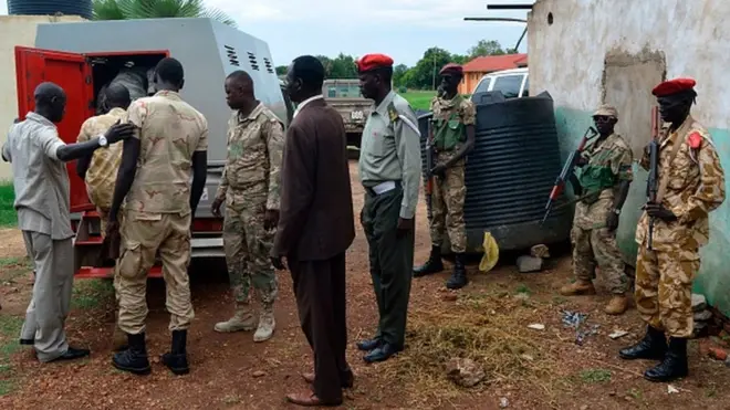 Security forces dey escort South Sudan soldiers wey dem suspect say rape five foreign aid workers come kill one local journalist