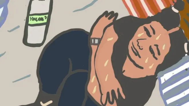 Monique shivering in her bed late at night