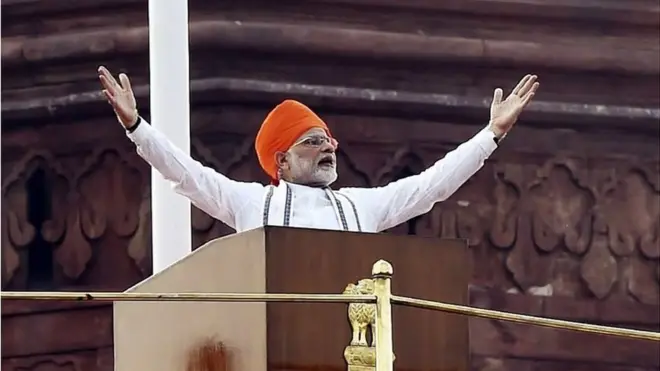 Indian Prime Minister Narendra Modi gestures while delivering his speech as part of India"s 72nd Independence Day celebrations, which marks the 71st anniversary of the end of British colonial rule, at the Red Fort in New Delhi on August 15, 2018.