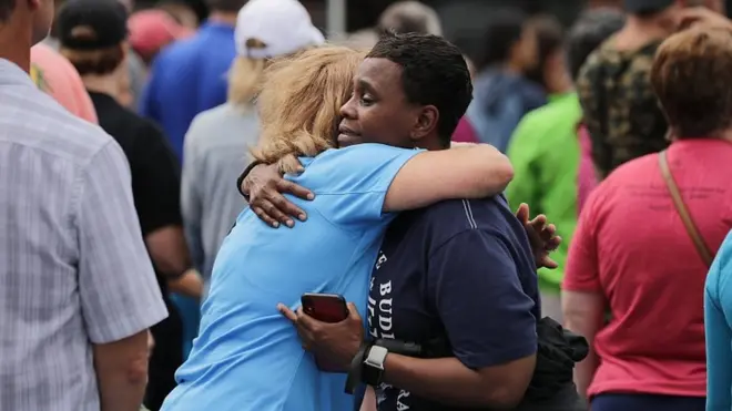 People gather for a public prayer service on June 1, 2019 in Virginia Beach, US