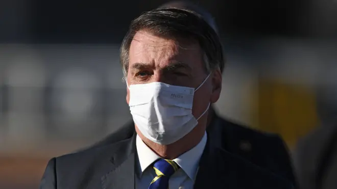File photo showing Brazilian President Jair Bolsonaro wearing a face mask (12 May 2020)