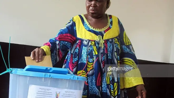 A woman casts her ballot on polling day in Yaoundé