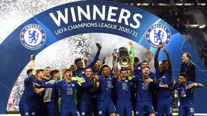Chelsea players lift the Champions League trophy
