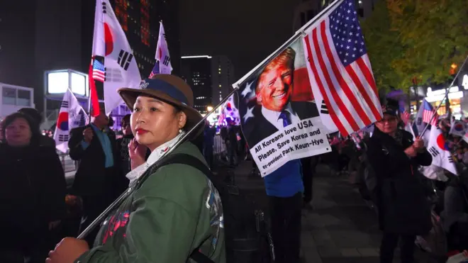 كوريون جنوبيون يرحبون بترامب