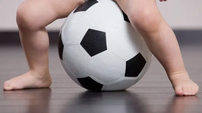 Baby on a football
