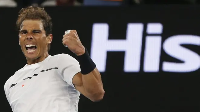 Rafael Nadal merayakan kemenangan melawan pemain Kanada, Milos Raonic.