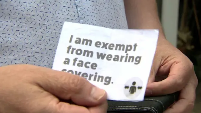 Nick showed his exemption card to the plane's pilot