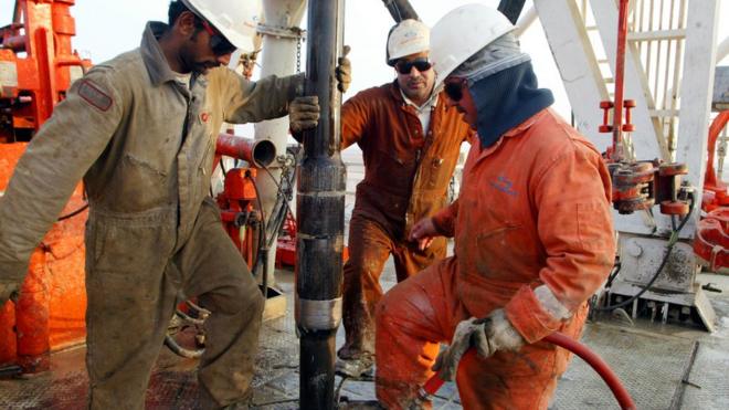 Oil workers in Kuwait