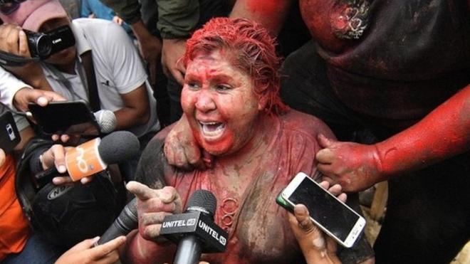 Patricia Arce speaks to the media after being attackedby a crowd that sprayed her with reddish paint and cut her hair in Vinto, Bolivia, 06 November 2019