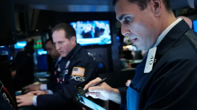 Traders work on the floor of the New York Stock Exchange (NYSE) on March 02, 2020 in New York City.