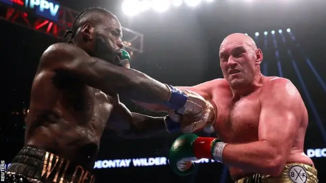Deontay Wilder (l) and Tyson Fury