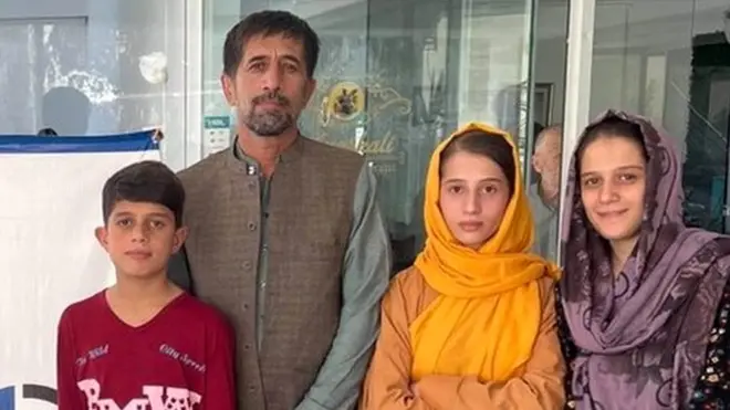 Mr Khalili (third from right) and his family