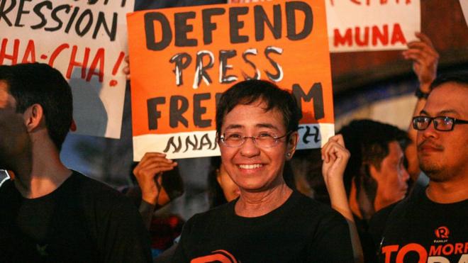 Participates calling for press freedom in Manila.