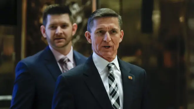 Retired Lt Gen Michael Flynn (R), with his son Michael Flynn Jnr, at Trump Tower in New York