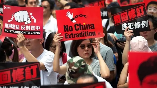 Thousands of protesters take part in a march against amendments to an extradition bill in Hong Kong, China, on 9 June 2019