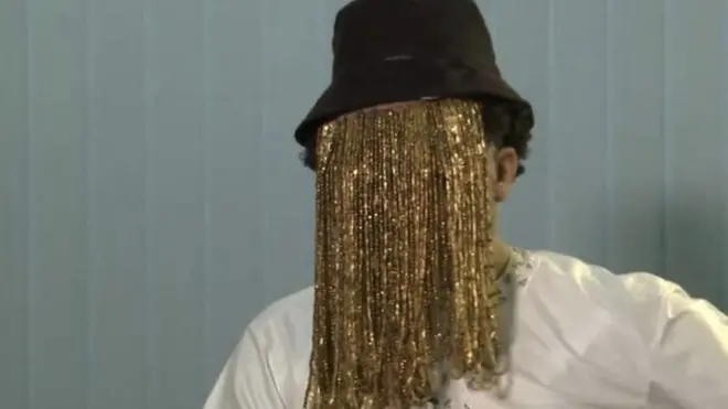 Anas Aremeyaw Anas wear mask cover face