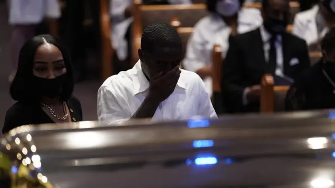 Mourners at George Floyd's coffin in Houston, 9 June