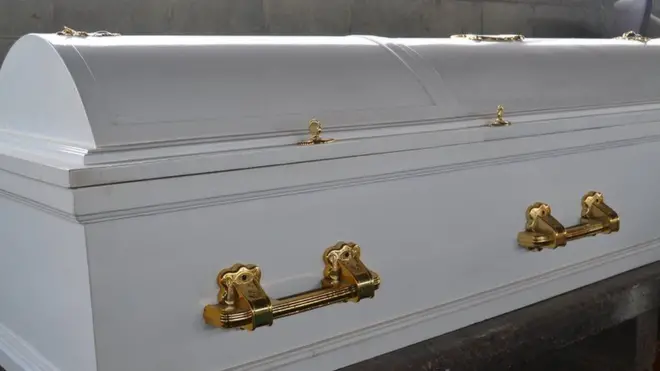 Some people for di funeral say di 'coffin birth' na witchcraft and dem suppose burn di dead woman and im pickin