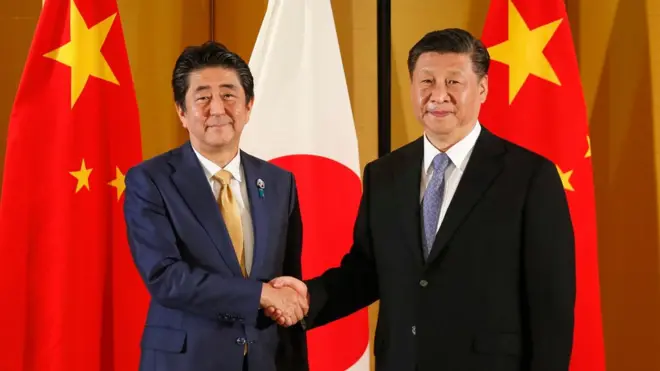 習近平與安倍晉三握手