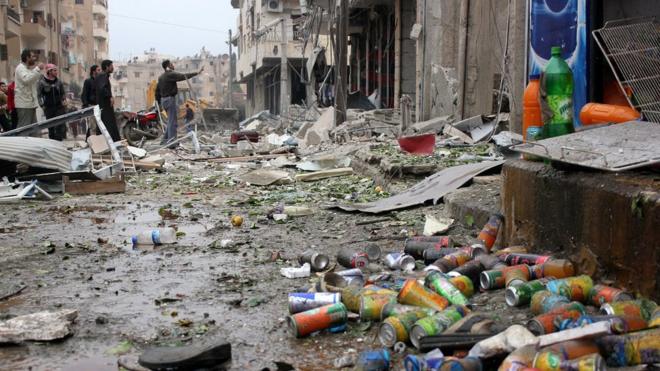 Последствия бомбордировки Ракки силами правительства Башара Асада в 2014 году