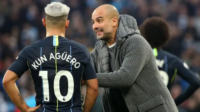 Sergio Agüero y Pep Guardiola.