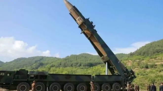 North Korea's Kim Jong-Un (2nd R) inspects the test-fire of an Intercontinental Ballistic Missile in July 2017
