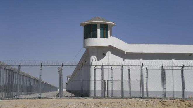 This photo taken on May 31, 2019 shows a watchtower on a high-security facility near what is believed to be a re-education camp where mostly Muslim ethnic minorities are detained, on the outskirts of Hotan, in China's northwestern Xinjiang region.