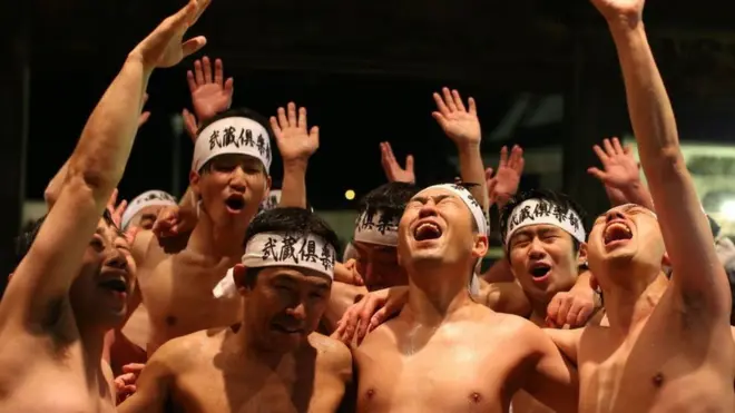 The men who find the two sticks are thought to be the luckiest of the year