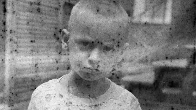 slika decaka iz starog filma