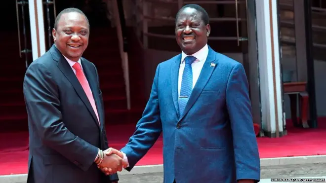 Kenya's President Uhuru Kenyatta (L) and National Super Alliance (NASA) coalition opposition leader Raila Odinga pose for a photo for press conference