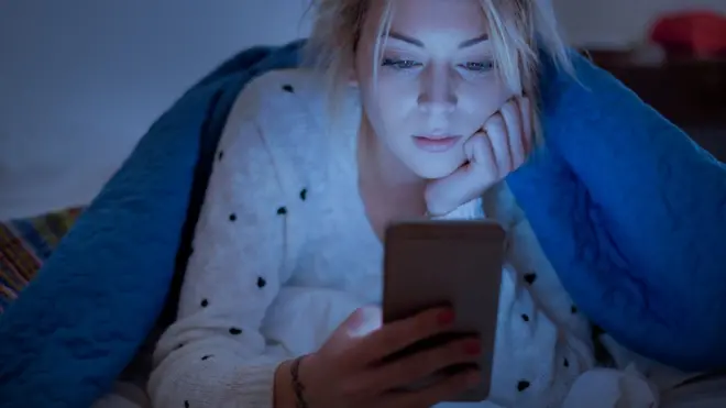 woman using her mobile phone