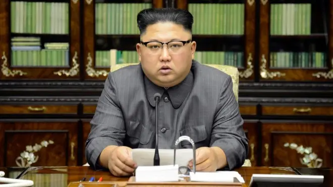 North Korean state media released this picture of Mr Kim delivering his statement