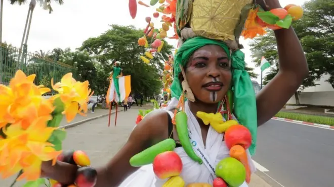 People take part in a parade during the 5th African Union - European Union (AU-EU) summit will take place is pictured in Abidjan, Ivory Coast November 30, 2017.