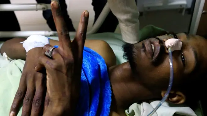 أحد جرحى الاعتداء على معتصمين في الخرطوم