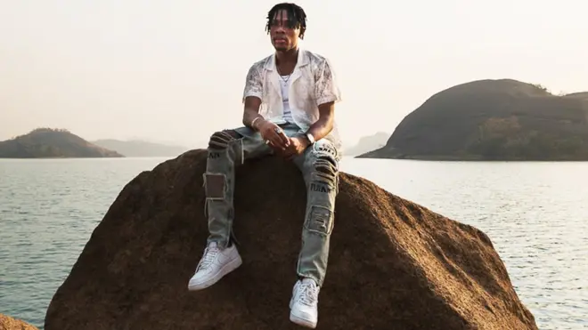 Album cover for Joeboy's Somewher Between Beauty and Magic