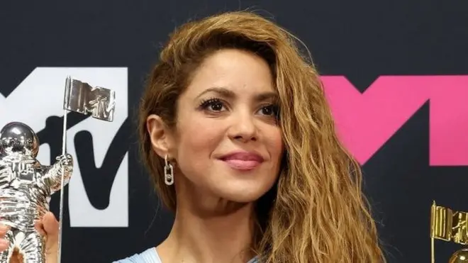 Shakira poses with her Video Vanguard Award and her Karol G's Best Collaboration Award in September 2023.