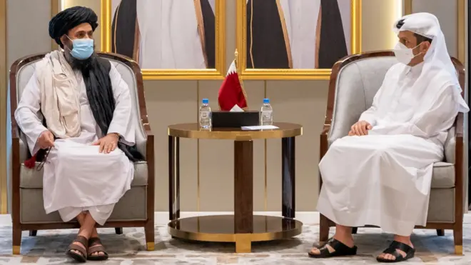 Qatar's Deputy Prime Minister and Minister of Foreign Affairs Mohammed bin Abdul Rahman Al Thani meets with Mullah Abdul Ghani Baradar, head of the Taliban's political bureau, in Doha, Qatar (17 August 2021)