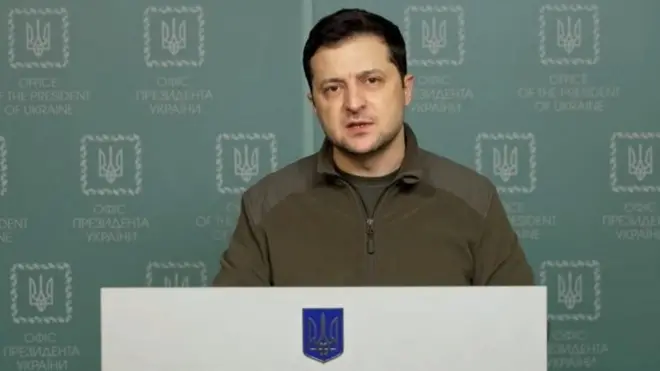 A still image taken from a handout video made released by the Ukrainian Presidential Press Service on 26 February 2022 shows Ukrainian President Volodymyr Zelensky speaking about the current situation in Kiev, Ukraine.