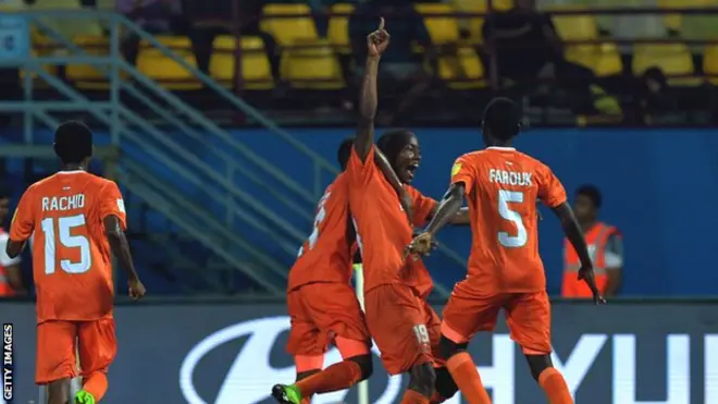 Salim Abdourahmane of Niger celebrates after scoring their goal against North Korea