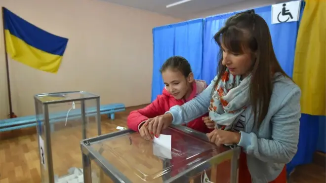 Жінка на виборах