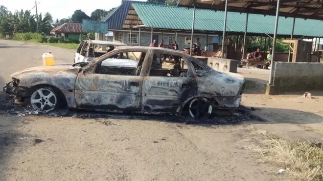 Burnt car at Okwali community