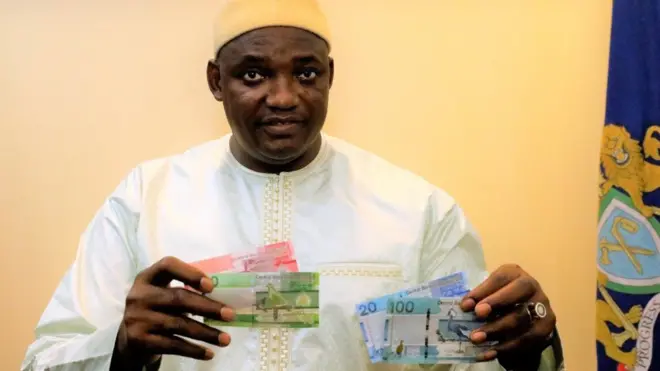 Gambia president Adama Barrow with di new note