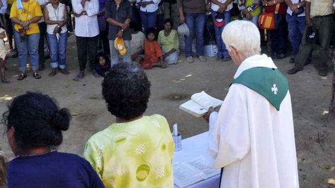 A Catholic priests officiates a mass in north-eastern Bolivia. File photo