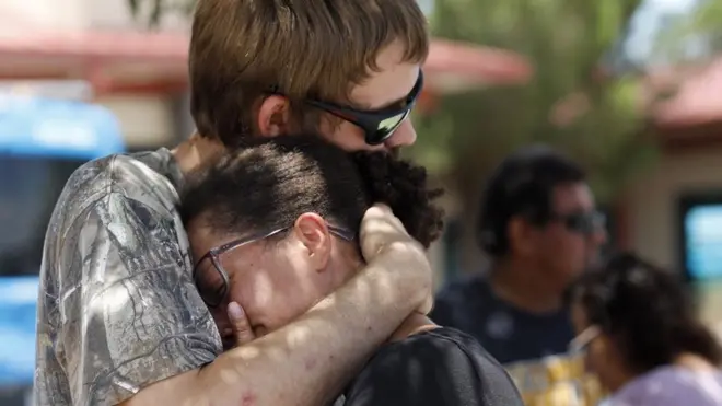 Kianna Long, right, spoke of the panic in Walmart