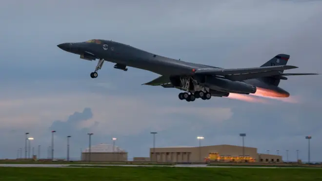 In this US Air Force image obtained from the US Defense Department, a US Air Force B-1B Lancers takes off from Andersen Air Force Base, Guam, 10 October 2017