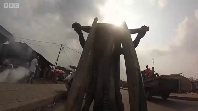 Boy wey dey push Chukudu bike