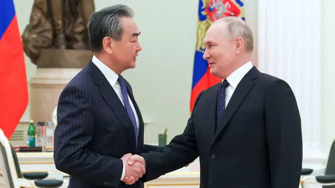 Russia's President Vladimir Putin attends a meeting with China's Director of the Office of the Central Foreign Affairs Commission Wang Yi in Moscow, Russia February 22, 2023.